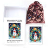 Snowman in front of Christmas wreath wooden original jigsaw puzzle - Unipuzzles